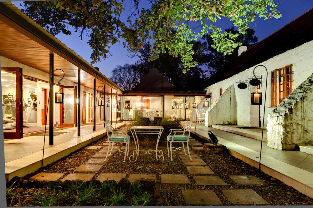 Irene Country Lodge, Autograph Collection Centurion Exterior photo The courtyard of the house